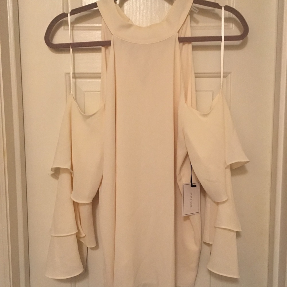 1. State open shoulder blouse